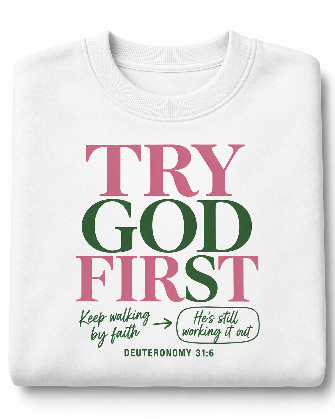 Try God First Deuteronomy 31:6 pink and green crewneck, folded