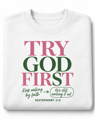 Try God First Deuteronomy 31:6 pink and green crewneck, folded