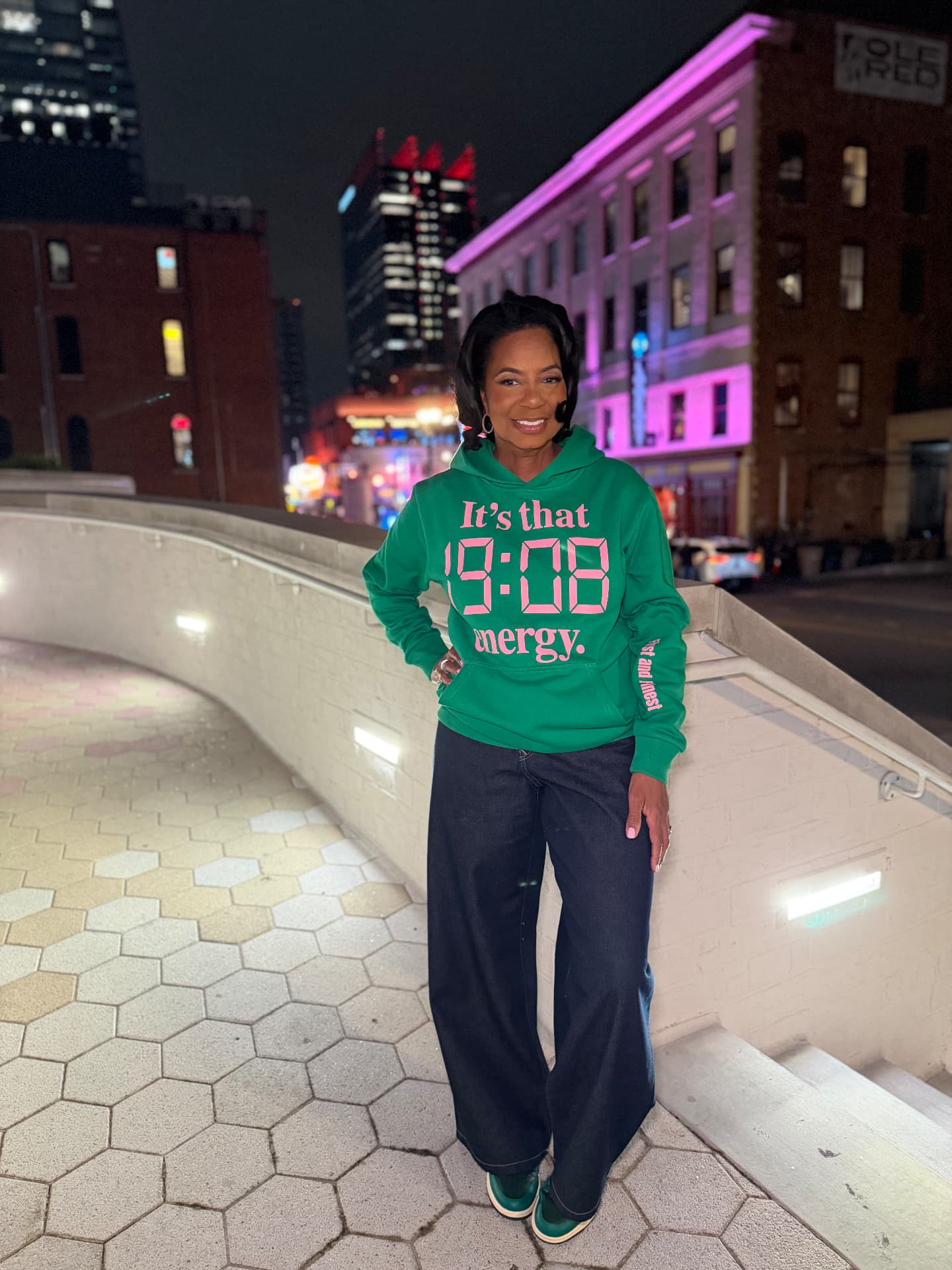 Model wearing the 19:08 Energy Hoodie showing First and Finest on the left sleeve